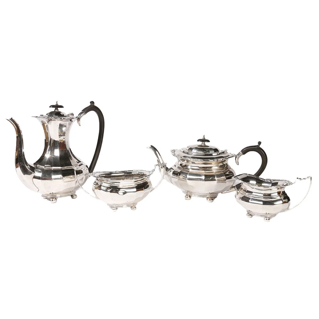 A GEORGE VI SILVER TEA AND COFFEE SET. — Silver — Bishop & Miller