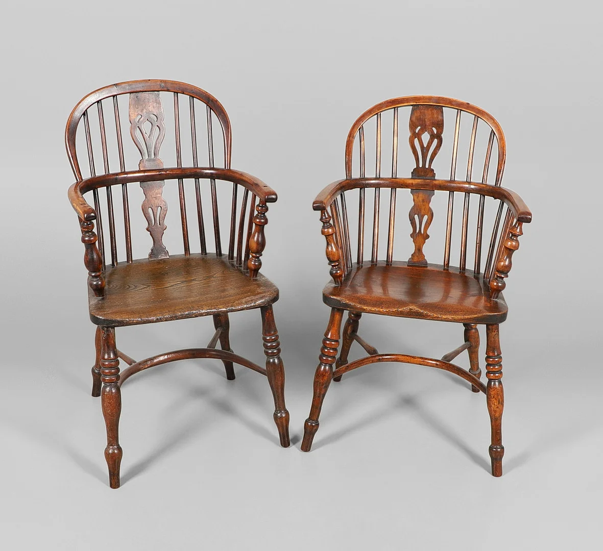 A NEAR PAIR OF YEW WOOD WINDSOR ARMCHAIRS. — Armchairs & Chairs — Lawrences Auctioneers
