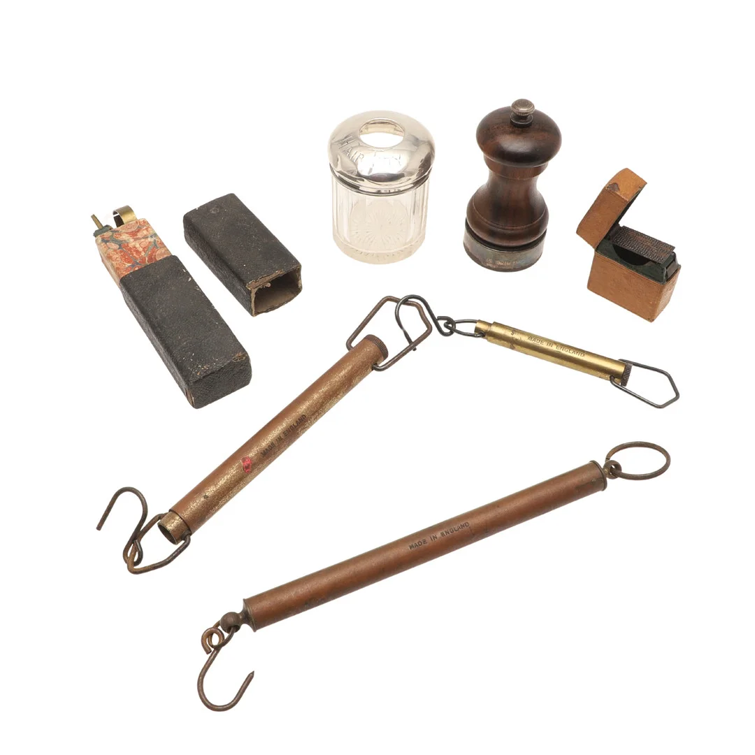 A SILVER MOUNTED GLASS JAR, A SILVER MOUNTED WOODEN PEPPER MILL AND A LEATHER CASED LIGHT BOX. — Silver — Lawrences Auctioneers