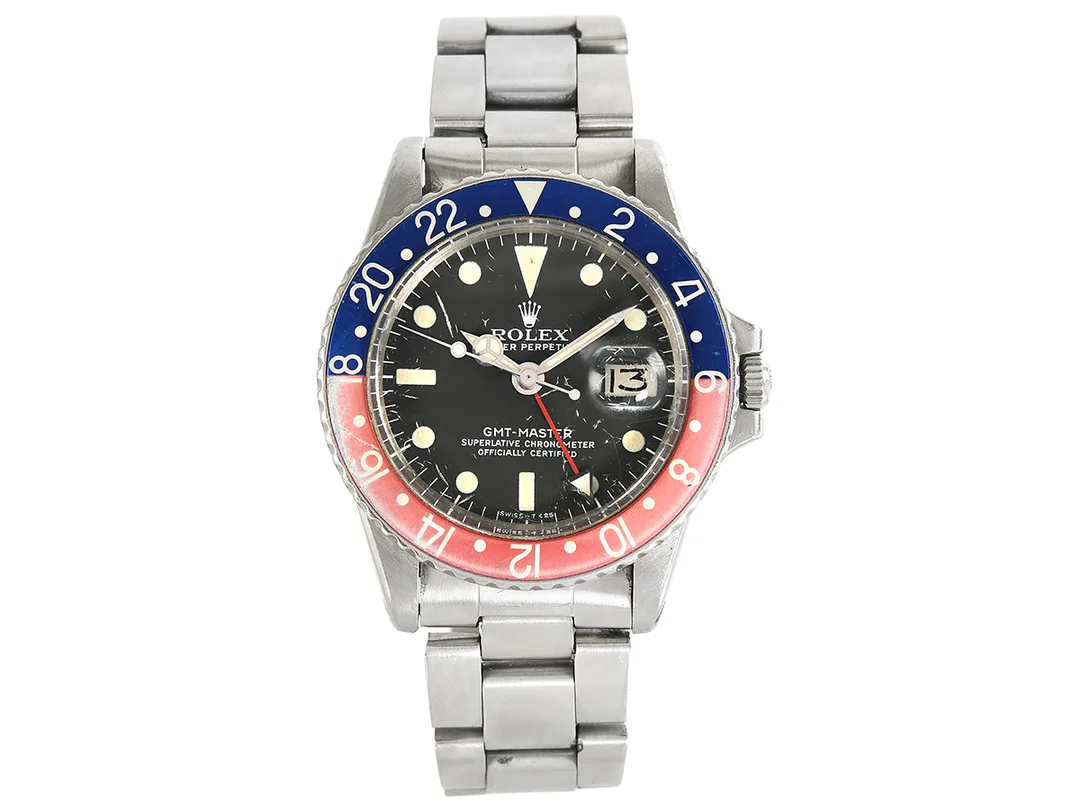 ROLEX, Oyster Perpetual, GMT-Master (Swiss-T<25), Chronometer, Ref nr. 1675, Serie nr. 3100410, Cal 1570, Verk nr. D194056, Boett nr. 1675 (II 71), herrur, 39 mm, stål, automatisk, plexiglas, datum, Oysterlänk, viklås, Ref nr. 78360-1.76/580, tillverkad andra kvartalet 1971, cert, maj 1977. — Klockor/Rolex — Kaplans