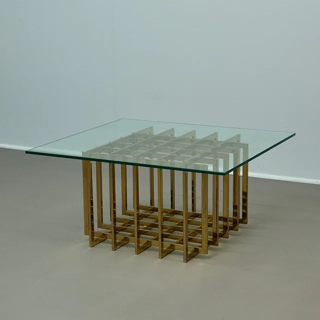 PIERRE CARDIN. Couchtisch, Messing, Glas, 1960er Jahre, Frankreich.
