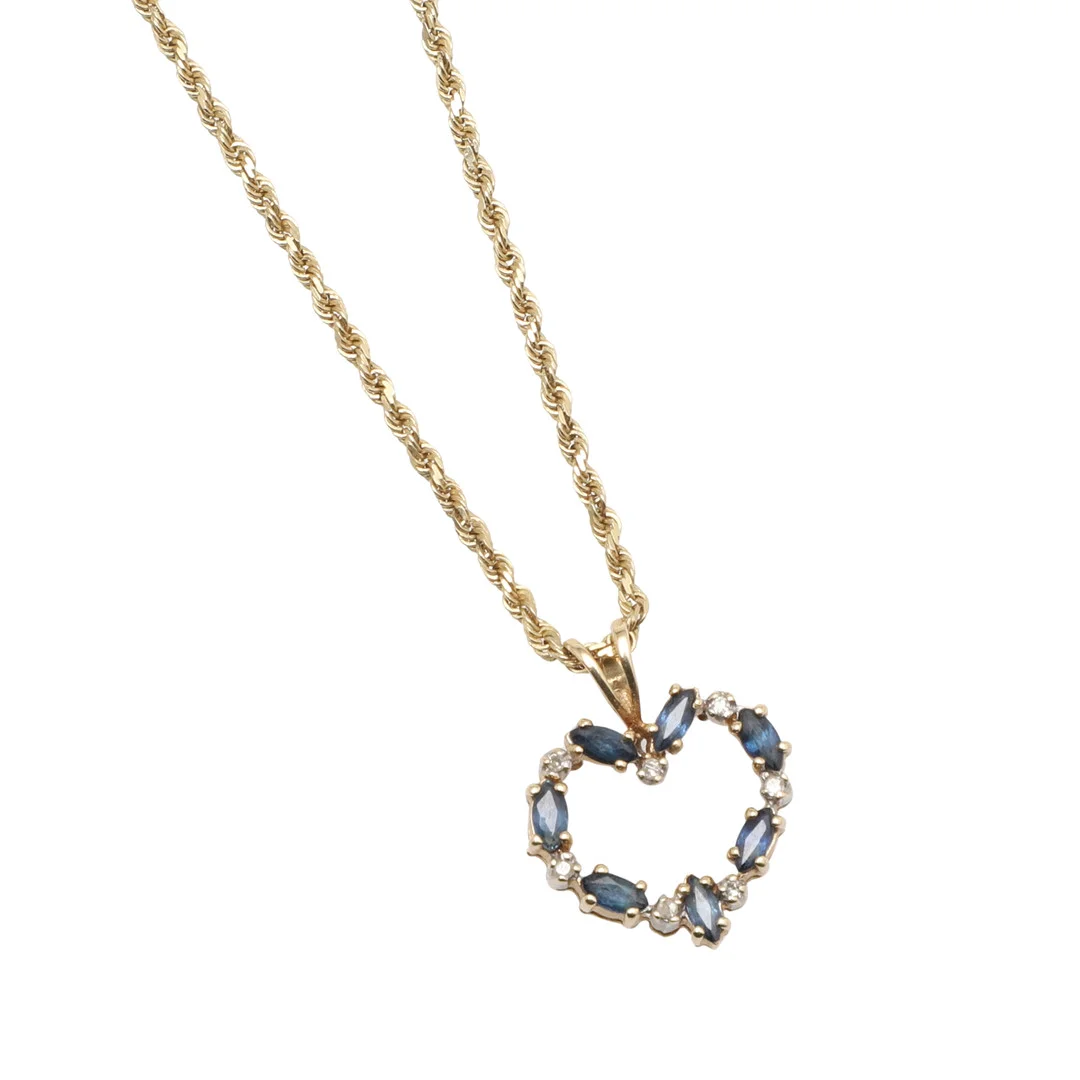 A 14CT GOLD SAPPHIRE AND DIAMOND HEART PENDANT AND CHAIN. — Brooches & Pendants — Lawrences Auctioneers