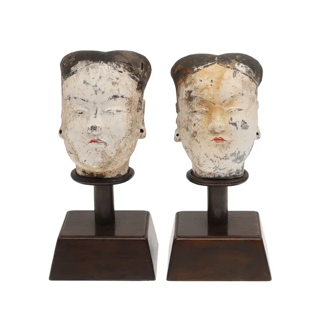PAIR OF CHINESE POTTERY HEADS - HAN DYNASTY.