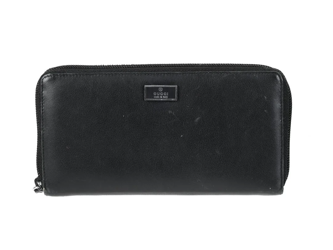 PLÅNBOK, GUCCI, svart läder, 19x10x2 cm, mynt, kontokort, sedlar, kartong, bruksslitage. — Accessoarer/Plånböcker — Kaplans