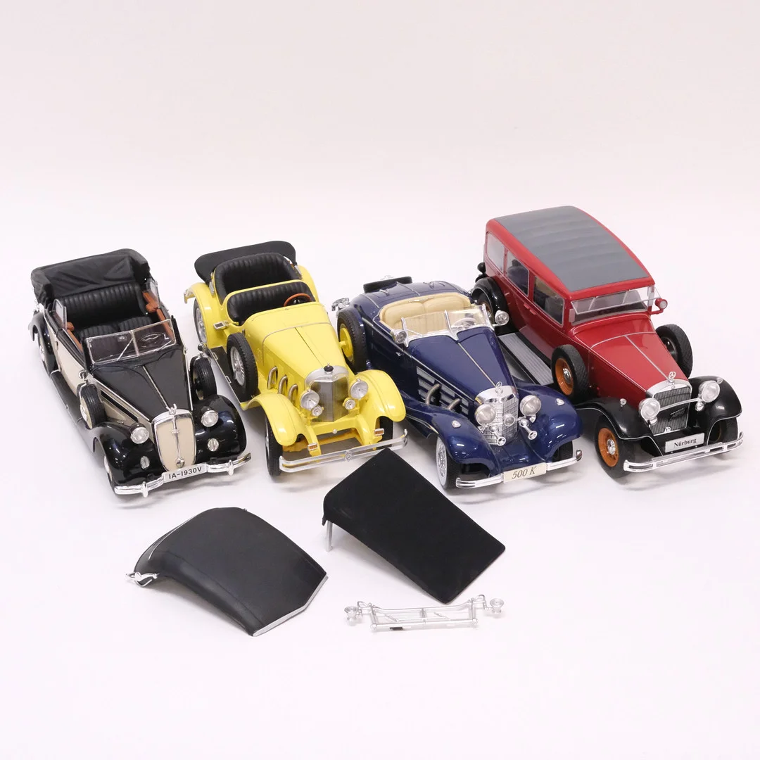 FYRA MODELLBILAR. RICKO OCH MAISTO. SKALA 1:18. — Model cars — Björnssons Auktionskammare