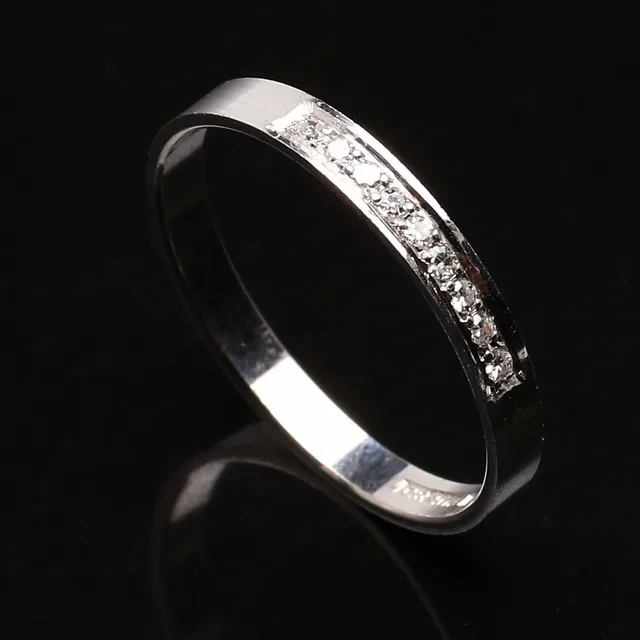 ALLIANSRING i 18K vitguld med briljanter, 0.06 ct.