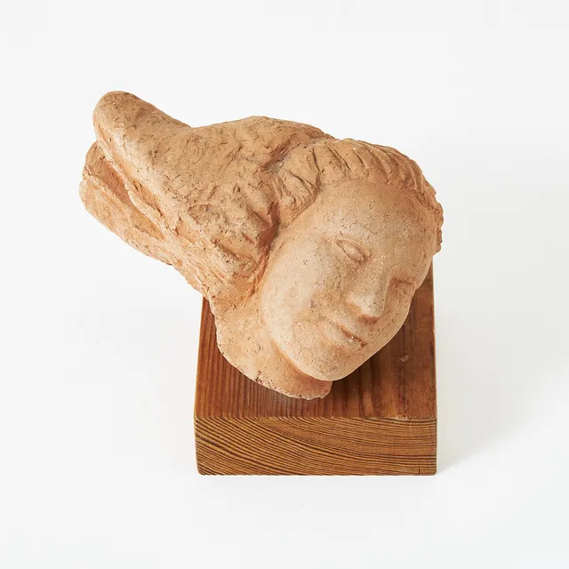 AXEL WALLENBERG. Skulptur, kvinnohuvud, terrakotta, signerad.