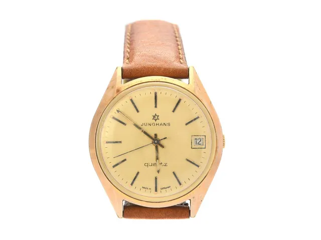 JUNGHANS, herrur, 36 mm, Boett nr. 1079015, gulmetall, quartz (går ej), plexiglas, datum, skadad urtavla, läderband, ca 1980.