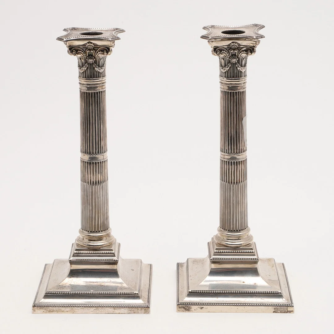 A PAIR OF VICTORIAN CANDLESTICKS. — Silver — Lawrences Auctioneers