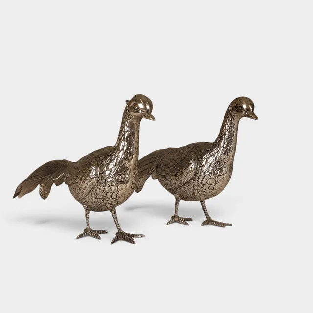 Pareja de faisanes en plata española punzonada. Siglo XX.