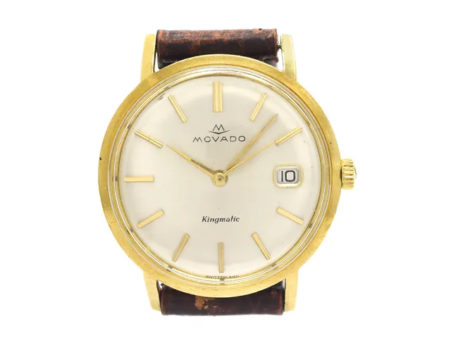 MOVADO,Kingmatic, Cal 538, Boett nr. 375 / 5261, herrur, 34 mm, 18K guld, automatisk, plexiglas, datum, skadad urtavla, defekt, skadad boett, läderband, ca 1960.