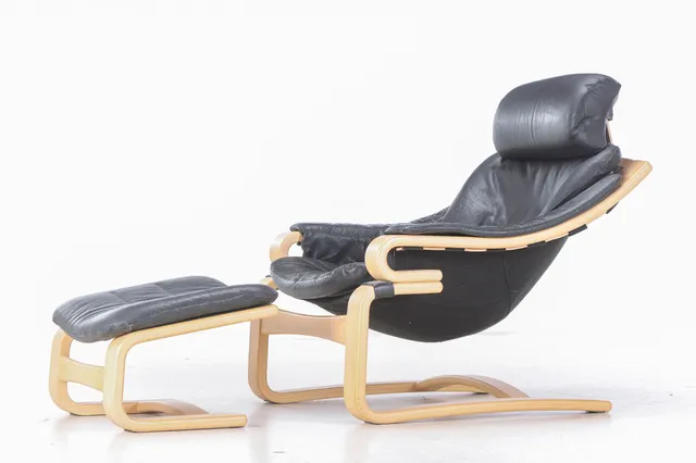 Skippers Furniture. Armchair / lounge chair with stool, black leather (2)
