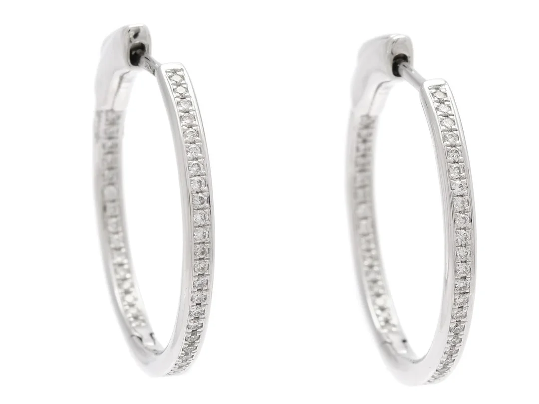 ÖRHÄNGEN, 18K vitguld, 82 briljantslipade diamanter ca 0,35 ctv, ca TW-TCr/SI-P, diameter 22 mm, flexmodell, vikt 5,4 g. — Smycken/Örhängen — Kaplans