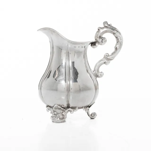 Christian Hammer, gräddkanna, silver, Stockholm 1857. Nyrokoko.
