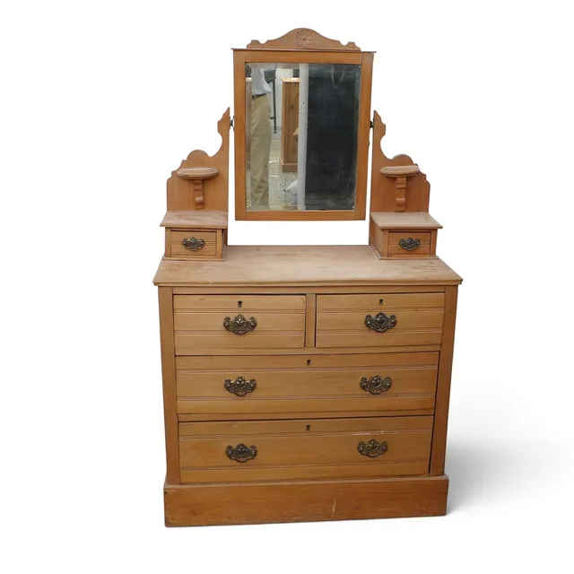 A PALE WALNUT DRESSING CHEST WITH MIRROR.