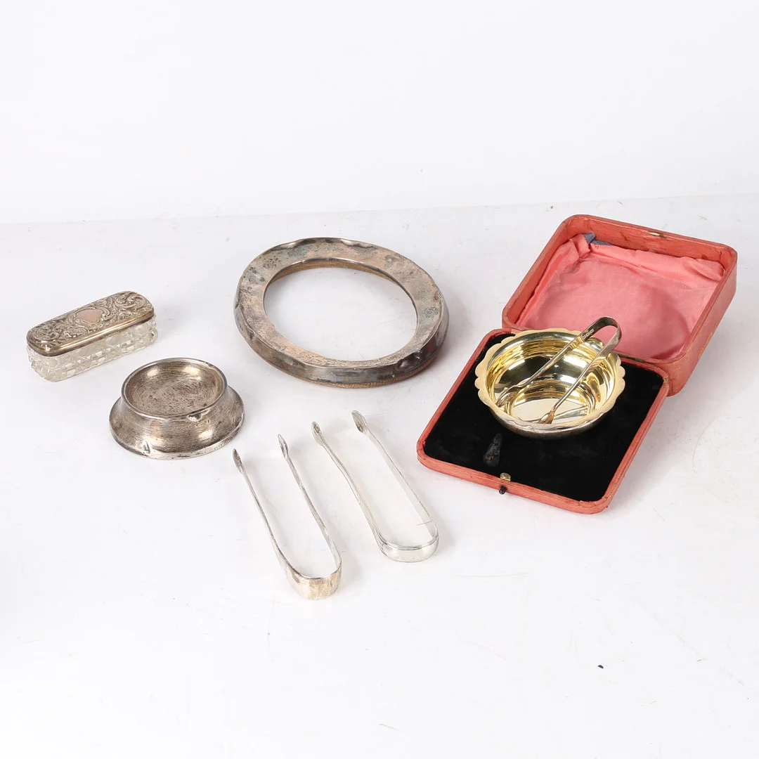 SILVER SUGAR BOWL AND TONGS, PICTURE FRAME, DRESSING TABLE POT, PIN DISH, TWO PAIRS OF SUGAR TONGS. — Silver — Bishop & Miller