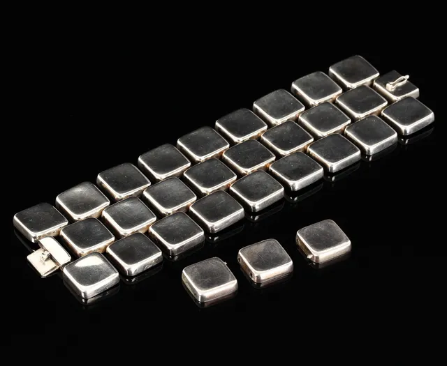 Astrid Fog for Georg Jensen. Wide articulated bracelet of sterling silver, dessin 193, approx. 1960