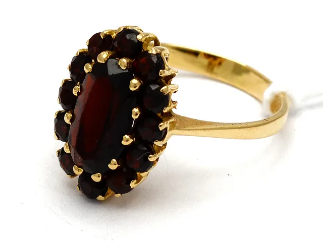 Ring 18K 3,8g med granater Ø17½