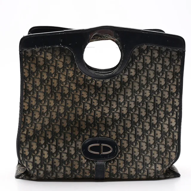 CHRISTIAN DIOR. Väska, "Oblique fold-over convertible clutch", skinn och textil, Frankrike, 1900-talets andra hälft.