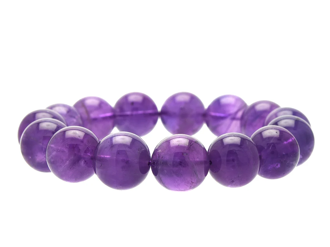 ARMBAND, ametist, kulor ca 13,6-14,2 mm, stretchband, vikt 55,6 g. — Smycken/Armband — Kaplans