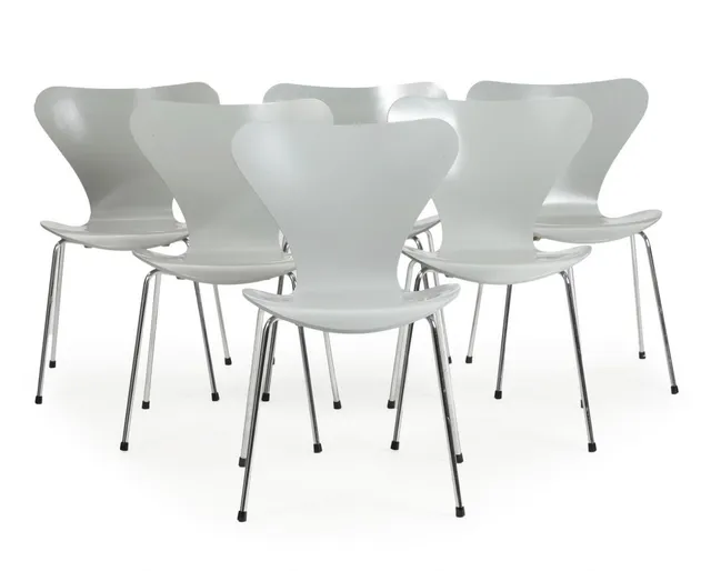 “Seven Chair”. A set of six chairs with grey lacquered plywood shells and chromed steel legs. Model 3107. Designed 1955. Manufactured and marked by Fritz Hansen, 1989. (6)