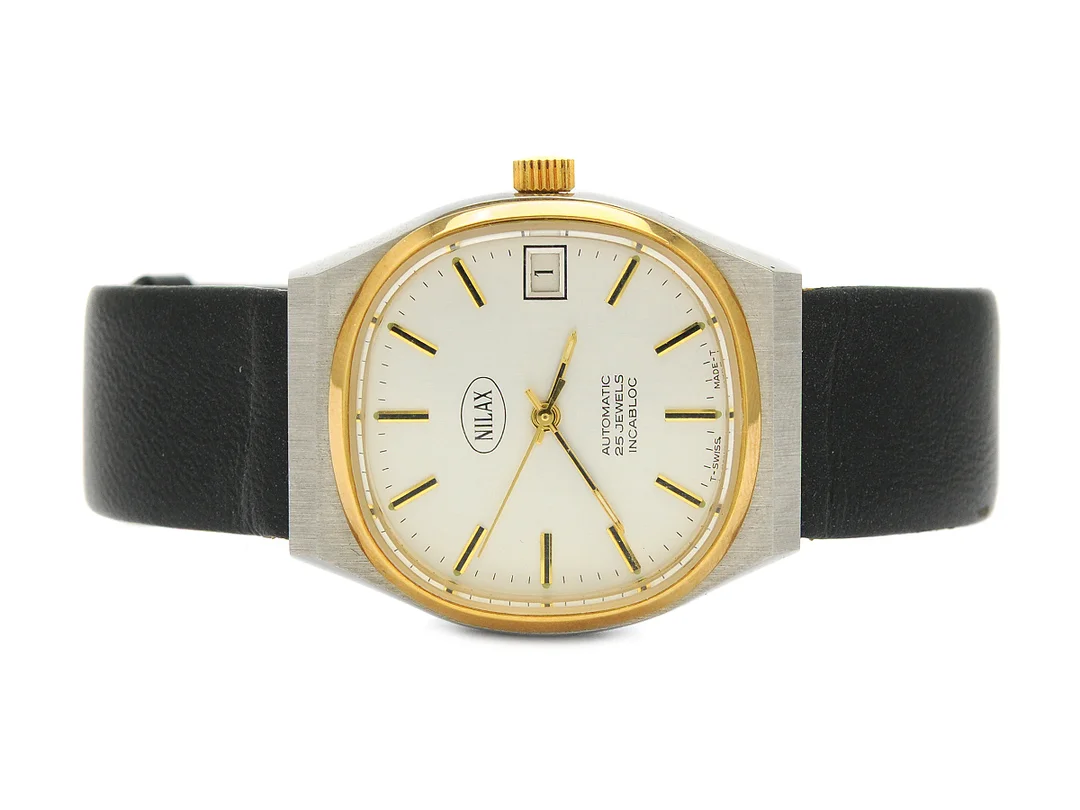 NILAX, herrur, 32 x 37 mm, Cal ETA 2872, Boett nr.3495-6W3, bicolour, automatisk, mineralglas, datum, skadad urtavla, läderband, ca 1980. — Klockor/Nilax — Kaplans