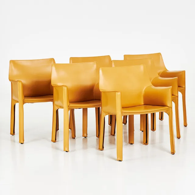 MARIO BELLINI. Karmstolar, 6 st, modell "413 CAB", för Cassina, Italien, samtida, klädda i gult läder.