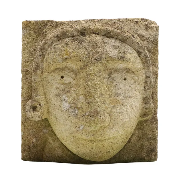 A MEDIEVAL STYLE CARVED STONE CORBEL.