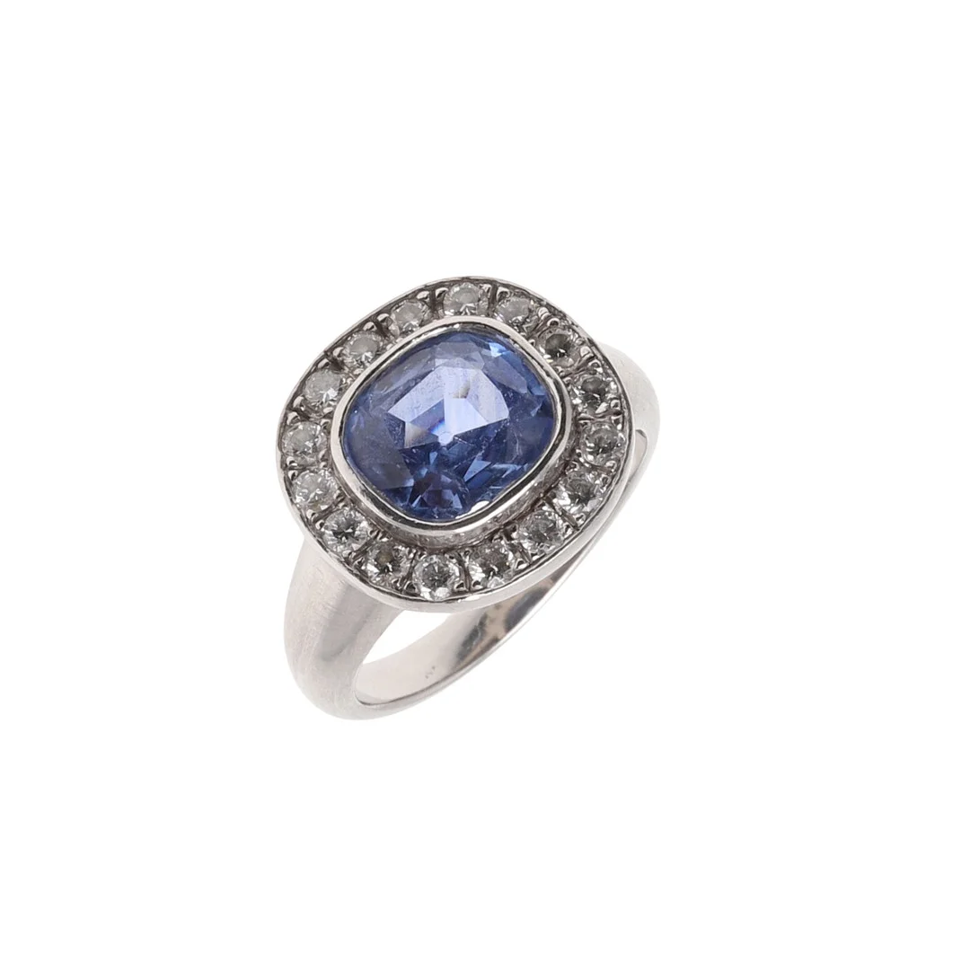 A SAPPHIRE AND DIAMOND CLUSTER RING. — Rings — Lawrences Auctioneers