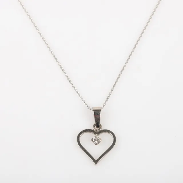 HÄNGE MED KEDJA, 18 K vitguld med briljantslipad diamant.