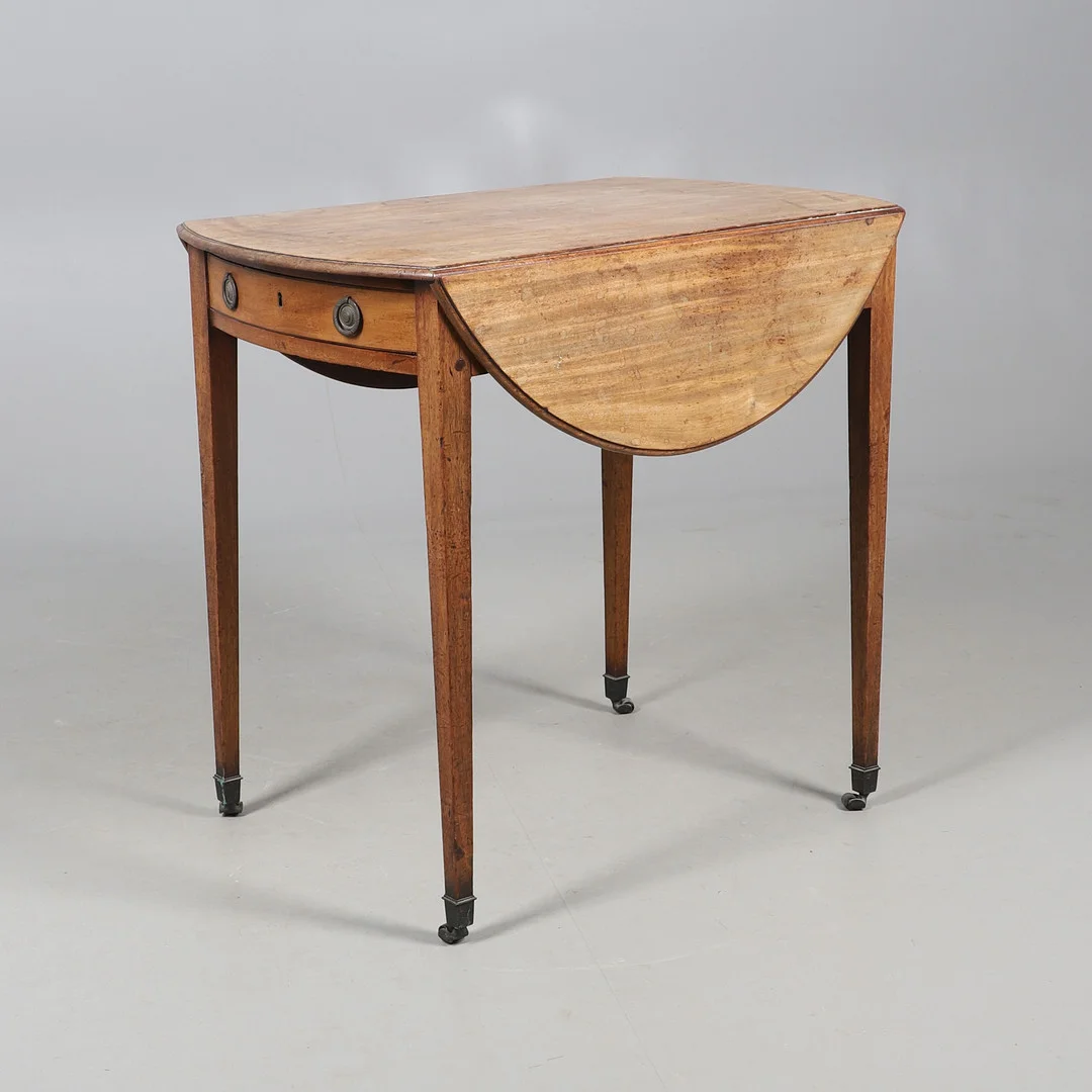 AN OVAL MAHOGANY PEMBROKE TABLE. — Tables — Lawrences Auctioneers