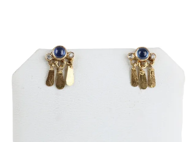Natascha Trolle: A pair of sapphire and diamond ear pendants of 18k gold. (2)