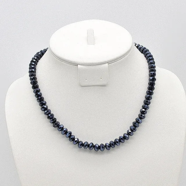 GLAS COLLIER, DUNKELBLAU UND FACETTIERT, ENDLOSKETTE AM FLEXBAND, VINTAGE, CA. 45CM.