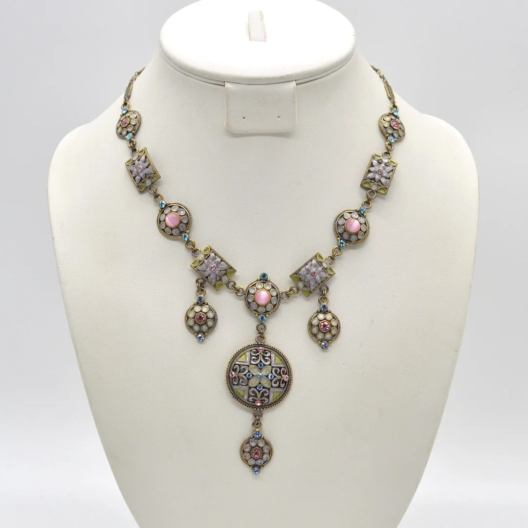 GLIEDERCOLLIER, PASTELL-EMAILLE, SYNTH. KATZENAUGEN IN ROSA, STRASSTEINE, FRÜHES 20. JAHRHUNDERT. — Necklace — Kunst- und Auktionshaus Kleinhenz