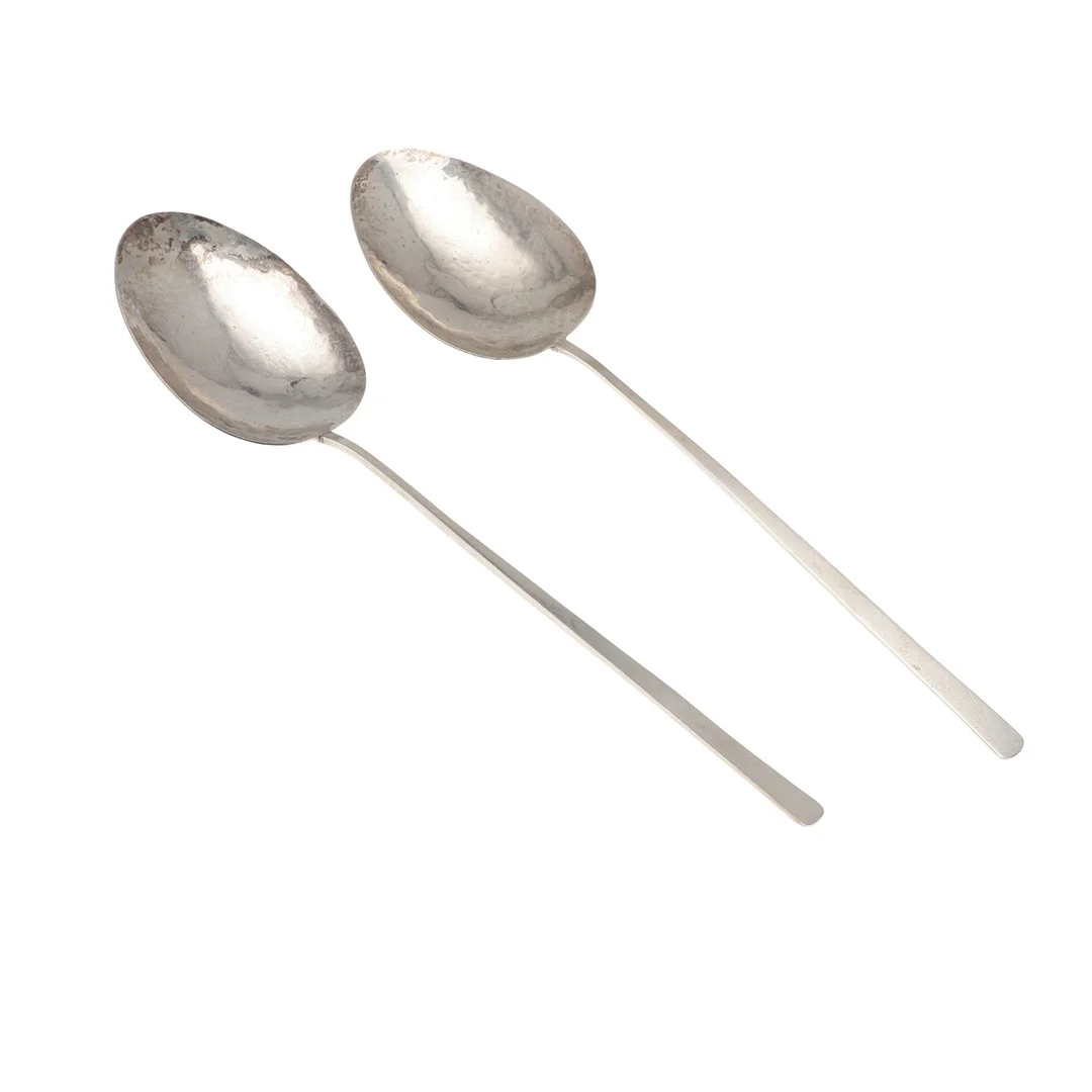 A PAIR OF DECORATIVE SLENDER STEM SPOONS. — Silver — Lawrences Auctioneers