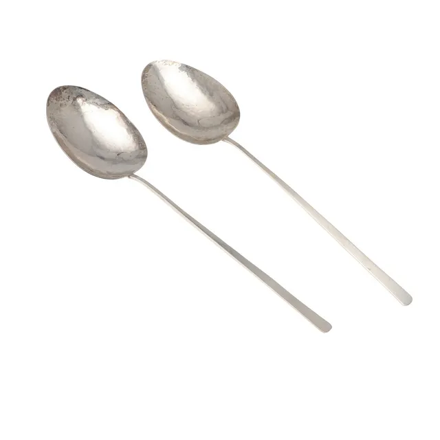 A PAIR OF DECORATIVE SLENDER STEM SPOONS.