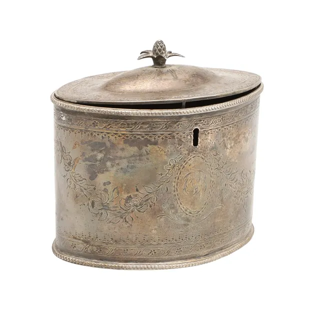 A GEORGE III TEA CADDY.