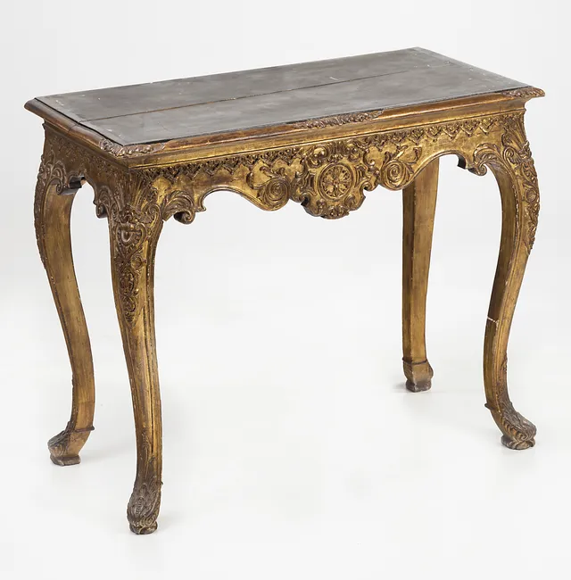 Louis XV-style Console in ebonized, carved and gilt wood, late 19th Century.