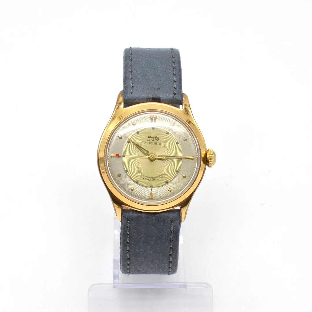 EUFA 21 RUBIS ARMBANDUHR, H+P GOLD PLATED, EXUDOR DBP, MIT HANDAUFZUG, 36MM. — Wristwatches — Kunst- und Auktionshaus Kleinhenz