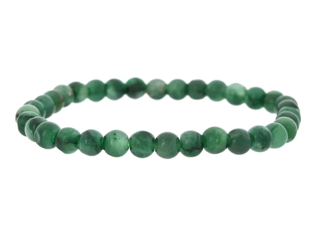 ARMBAND, grön kvarts, kulor ca 6 mm, trädd på elastisk tråd, längd ca 16 cm, vikt 8,6 g. — Smycken/Armband — Kaplans