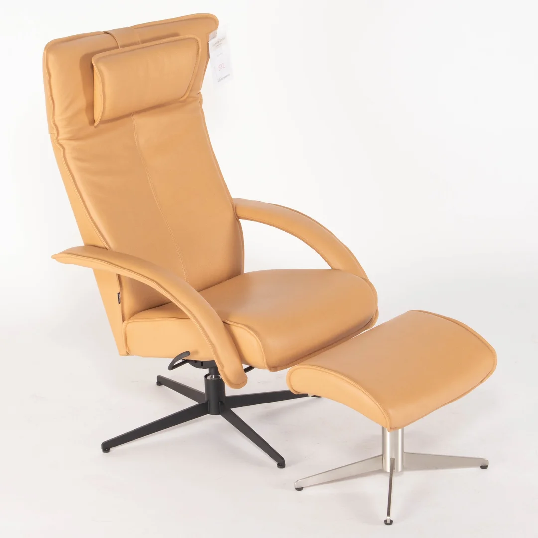 542. Brunstad. Armchair model Delta Motion with footstool (2) — Furniture/Lounge chairs — Lauritz