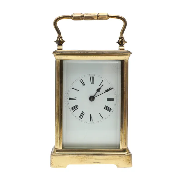 A BRASS CASED CARRIAGE TIMEPIECE.
