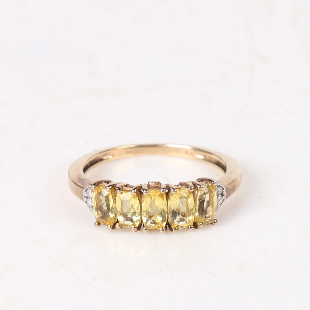 A 9 CARAT GOLD, YELLOW QUARTZ AND DIAMOND RING. — Rings — Bishop & Miller