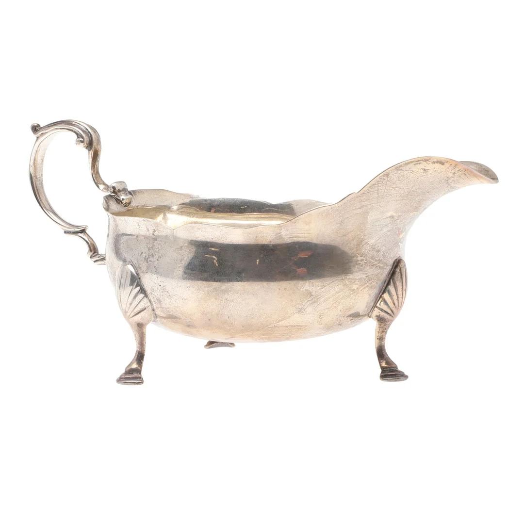 A GEORGE III NORTH COUNTRY PROVINCIAL SILVER SAUCE BOAT. — Silver — Lawrences Auctioneers