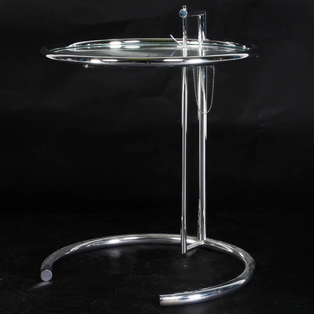 Eileen Gray. Adjustable side table, model E 1027 — Furniture/Coffee tables, occasional tables — Lauritz