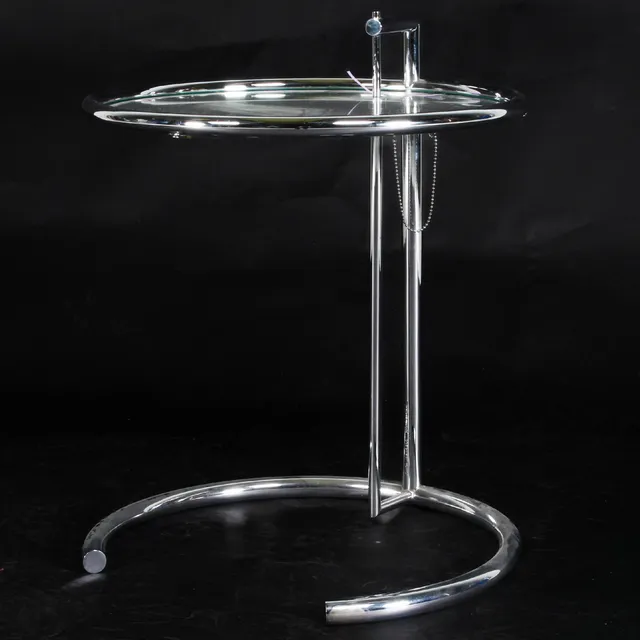 Eileen Gray. Adjustable side table, model E 1027
