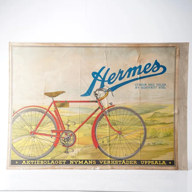 HERMES - NYMANS VERKSTÄDER, pappskylt, 1930/40-tal.