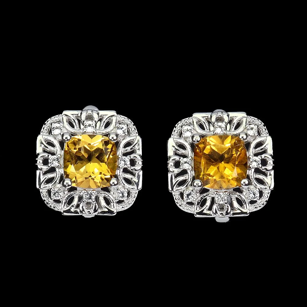 Earrings in rhodium-plated Sterling silver adorned with yellow citrines, surrounded by topazes — Jewellery/Earrings — Lauritz