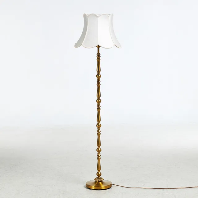 EINAR BÄCKSTRÖM. Golvlampa, 1 ljuspunkt, mässing, modell 7017, stämplad.