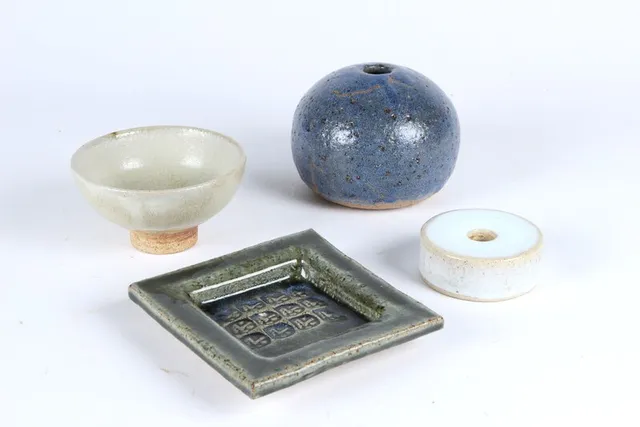 Conny Walther. Vase, bowl, candlestick and dish of glazed stoneware. (4)